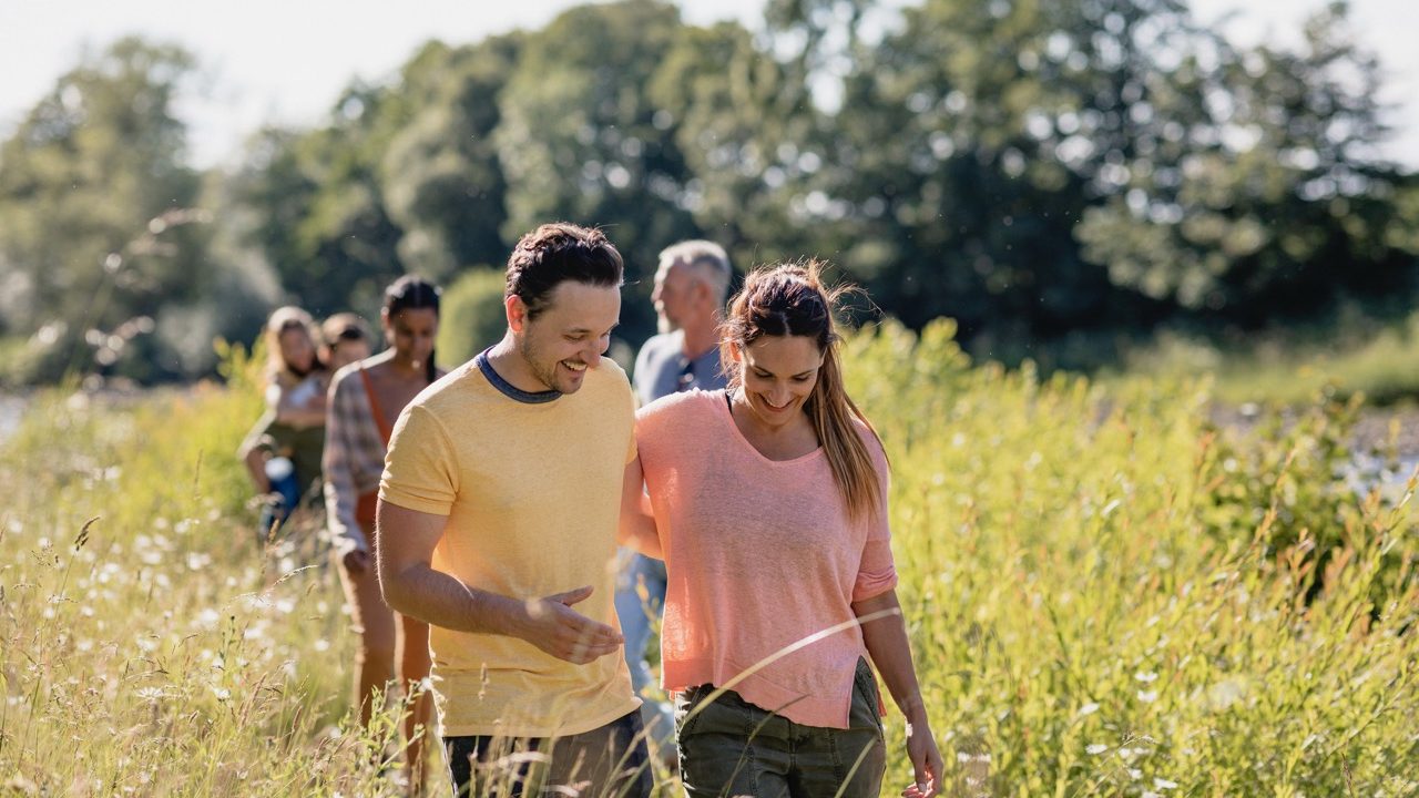 People Walking through a field